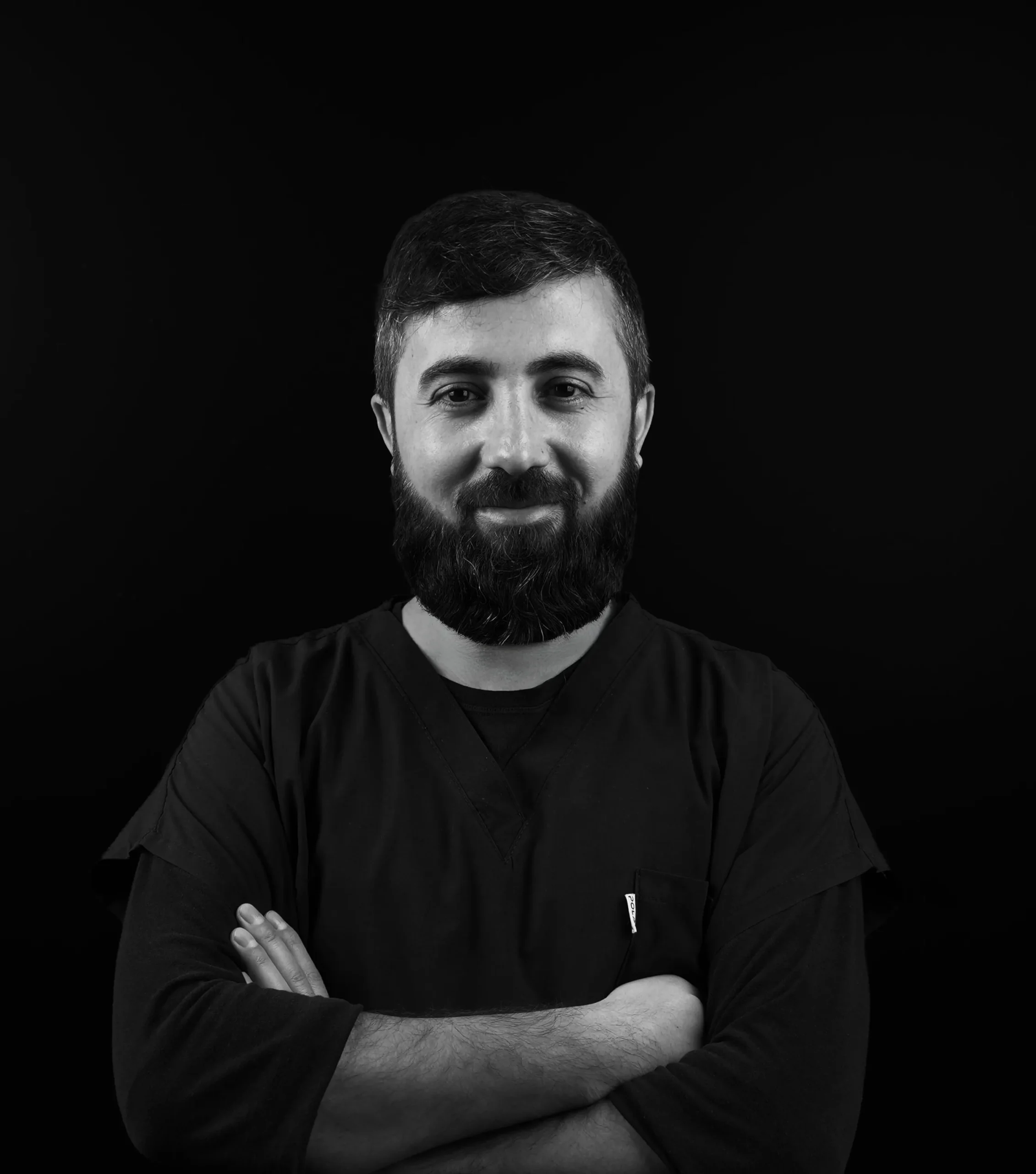 Professional portrait of Mesut, a skilled Dental Laboratory Technician specializing in high-precision dental prosthetics at Darya Dental Clinic.